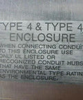 Label on Used Industrial Control Panel Enclosure N 379057, detailing Type 4X environmental rating for heavy duty metal cabinet.