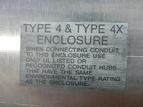 Label on Used Industrial Control Panel Enclosure N 379057, detailing Type 4X environmental rating for heavy duty metal cabinet.