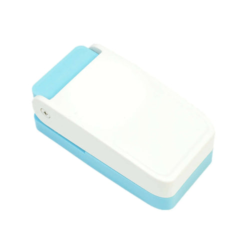 Handmade Scrapbooking One Inch Lever Punch Embossing Tool Dope Little Mini Fancy Punch Oval 25mm, top view in white and blue