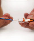 Hands holding Lever Nuts Compact Splicing Inline Wire Connectors Case Included 20 Pack for wiring copper wire to connector