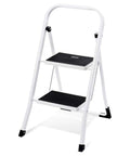 Heavy Duty Steel 2 Step Stool Ladder With Grab Handle Portable Folding Step Ladder Anti Slip Wide Pedal Lightweight Compact For Kitchen And Home ANSI A14.11 Certified Sturdy Durable White, image showing the ladder open with black pedals.