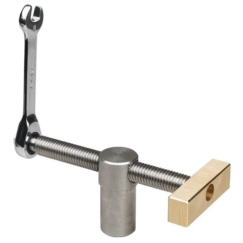 Professional Grade Woodworking Table Vise With Tenon Stop Strip Rock Steady Bench Fixture For Hardcore Carpenter And Machinist Shop Rig Built Tough Brass Workshop Clamp with a metal handle and brass stop.