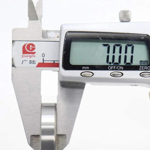 Measuring Sealed Cartridge Bearing Set 18 X 30 X 7 mm MR18307 RS 5 pack with caliper, width 7 mm displayed