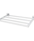Polished chrome Kubos towel rack in solid brass, with ample shelf space, corrosion resistant finish, minimalist bath organizer