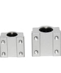 Two aluminum guide blocks for Four Pack Linear Motion Bearing Slides, designed for CNC and fabrication shops.