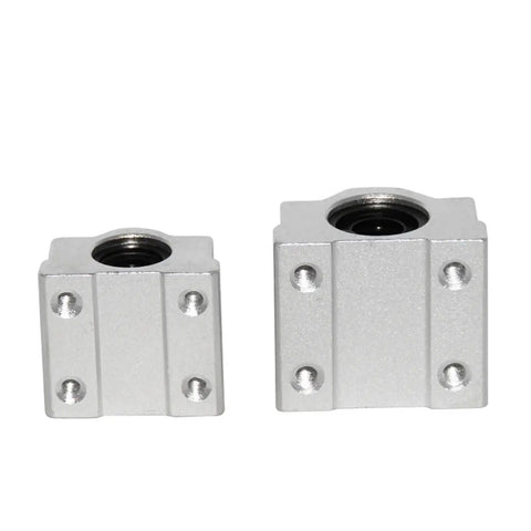 Two aluminum guide blocks for Four Pack Linear Motion Bearing Slides, designed for CNC and fabrication shops.