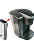 Replacement Water Reservoir With Lid For Keurig K-Elite K90 Coffee Maker, 75 Oz Brushed Silver Tank next to coffee maker
