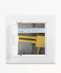 Sleek 3X3 Inch White Drywall Access Panel For Bathroom Plumbing Maintenance Durable Pvc Wall Cover Plate revealing yellow pipes.