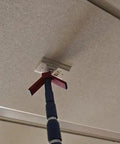 Rock Solid Dual Magnet Smoke Detector Test Tool For Fire Safety Systems With Quick Pole Thread Adapter and Duct Activation Features in use on ceiling.