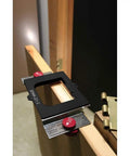 Hinge Mate 300 Door Hinge Installation Kit with latch and strike plate templates on door, adjustable for 1-3/8 or 1-3/4 inch doors.