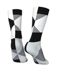 Upgrade Your Fit With Black And White Piano Grid Print Socks For Men And Women Moisture Wicking Polyester Crew Socks in geometric design.