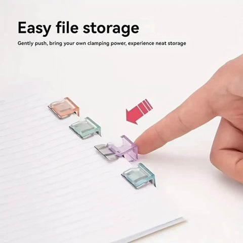 Hand using 20 Pairs Quick Fix Hem Clips and Reusable Clamps for Pants, Paper and Window Ventilation, Transparent Purple Tops