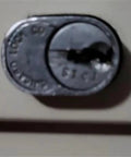 Heavy Duty Office Cabinet Replacement Key For S110 Core Fits Desk Drawers And Modular Cubicle Locks Genuine Oem Brass Hardware showing a close-up of a CompX Chicago lock.