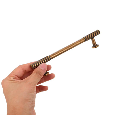 Hand holding Retro Style Cabinet Handle, Zinc Alloy Pull in Antique Bronze Finish, Vintage Wardrobe and Drawer Hardware, 128mm C-C