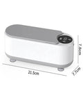 Portable Ultrasonic Cleaner With 360 Rotating Wash For Watches Jewelry And Dental Gear, compact design, 21.5cm x 7.8cm x 7.7cm.