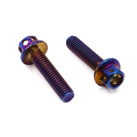 Close-up of two colorful M6 titanium alloy motorcycle fairing bolts from the 12-piece set for 1996 to 2023 models.