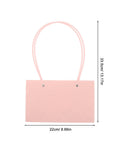 Front view of Pink Flower Bouquet Bags With Handle 10 Pack Pro Grade Kraft Paper Floral Packaging Bags Large Capacity Elegant Diamond Pattern