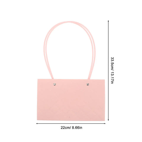 Front view of Pink Flower Bouquet Bags With Handle 10 Pack Pro Grade Kraft Paper Floral Packaging Bags Large Capacity Elegant Diamond Pattern