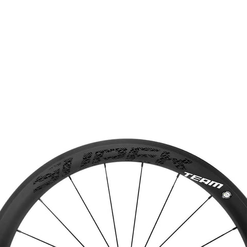 Close-up of 50mm Carbon Wheelset Ride Ready For Road Bikes 700C Tubeless Ready With R18 Hub featuring black rim and spokes.