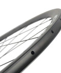 Rad Carbon Road Wheelset 700c Clincher Ride Ready 38mm Deep 23mm Wide Center Lock Toray T700 Matte 3K Finish close-up rim view