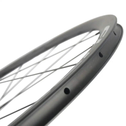 Rad Carbon Road Wheelset 700c Clincher Ride Ready 38mm Deep 23mm Wide Center Lock Toray T700 Matte 3K Finish close-up rim view