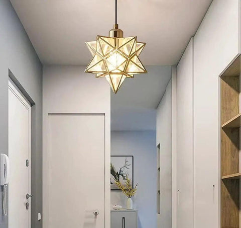 Lit Gold Ceiling Pendant Light With Star Design, Vintage Hanging Lamp in hallway, showcasing metal and clear PVC decor.