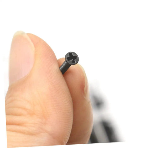 Kickass Miniature Screw Set Countersunk Flat Head Screws in hand showcasing a carbon steel flat head screw for repair projects.