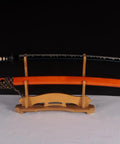 Handmade Practice Katana Sword Full Tang Japanese Samurai Blade For Iaido Training displayed on wooden stand