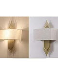 Swanky Modern Fabric Wall Sconce Featuring High Quality Shade for Soft Ambient Lighting Perfect for Bedroom Hallway and Living Room Space Super Chic Decor Piece with Eye Protection Rays and Minimalist Design That Really Slays Your Home Vibe, shown in two angles with gold accents and fabric shade.