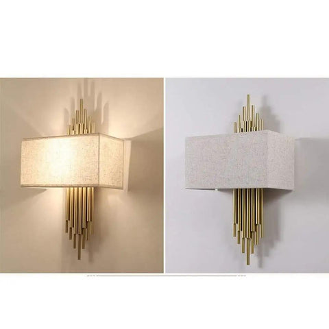 Swanky Modern Fabric Wall Sconce Featuring High Quality Shade for Soft Ambient Lighting Perfect for Bedroom Hallway and Living Room Space Super Chic Decor Piece with Eye Protection Rays and Minimalist Design That Really Slays Your Home Vibe, shown in two angles with gold accents and fabric shade.
