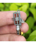 5mm Planetary Gearbox for Stepper Motor with precision ball bearing in hand, ideal for DIY CNC, 3D printer and robotic projects.