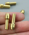 Top Tier Brass Drill Chuck Collet Bits Set With 3.17 Mm Shafts And Wide 0.5-3 Mm Range For Dremel Rotary Tools shown in hand.