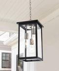 3 Light Outdoor Pendant Light Fixture In Black And Brushed Nickel Finish With Clear Glass Hanging on Patio Porch