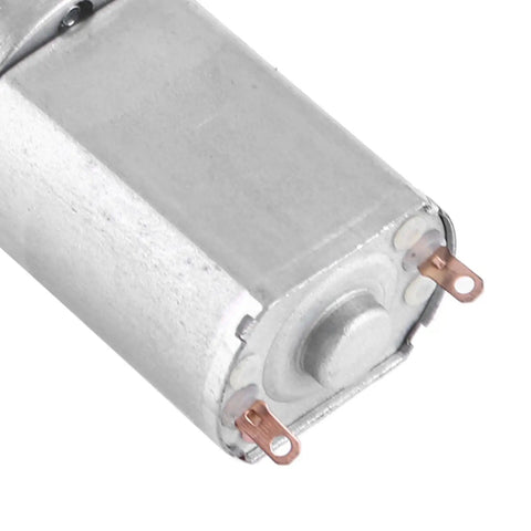Pro Grade 12 Volt DC Gear Motor Delivers Darn Smooth Power With Full Metal Gears For High Torque Auto Mods And Wrenching Projects, close-up of motor terminals.