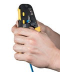 Hands using RJ45 Cable Tester Kit With LAN Scout Jr 2 All In One Coax Crimper Stripper And Cutter Tool on a blue cable
