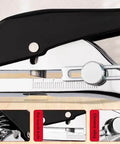 Side view of Beast Of A Heavy Duty Single Hole Punch Handheld Paper Punch for Crafts Cards Tags Scrapbooks, black ergonomic handle.
