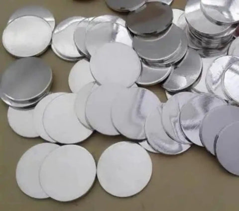 316 Stainless Steel Spacer For CR2032 Coin Cell Battery 15.8 X 1 mm Flat Gasket 1000 Pack scattered on surface