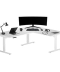 Super Spacious L Shaped Electric Standing Desk With Smooth Silent Lift And Built Tough White Frame Design For Triple Screen Setups, 72x60 inch.