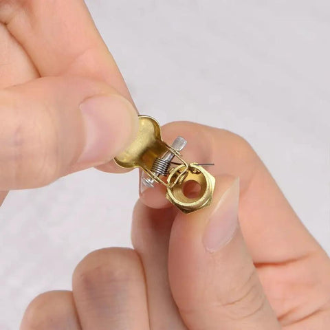 Close-up of 4 Pack Brass Spring Grease Oil Cup Cap showing detail of brass and spring mechanism for lathe machine power accessories.