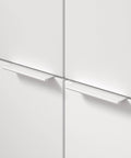 Lincoln Collection 3 1/8 Inch Center to Center White Modern Cabinet and Drawer Edge Pull Handle installed on white cabinets