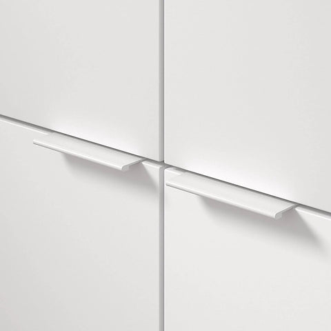 Lincoln Collection 3 1/8 Inch Center to Center White Modern Cabinet and Drawer Edge Pull Handle installed on white cabinets