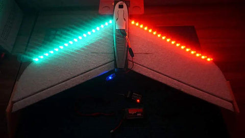 Remote Controlled LED Light Strip For RC Fixed Wing Airplanes And AR Wing Drones With Red And Green LEDs Transmitter Ready And Y Cable Included illuminated in dark