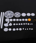 Plastic Gears Kit With Pulleys Belts For DIY Robot Motors And Model Projects Six Gear Sets 34 Gear Packages on black background.