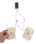 Person holding parts of All-In-One Electrical Circuit Kit for Kids with connected wires, kid-friendly STEM experiment components.