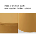 Totally Legit Go To Upgrade Your Living Room Featuring This Premium Hourglass Side Table Doubling As A Round Accent Stool Fully Versatile Dual Sided Plastic Design Built For Chill Vibes Makeup Sessions Or Casual Shoe Changing In Ginger close-up of ginger plastic finish highlighting wear and break resistance features.