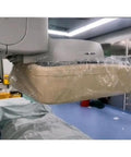 Clear Single-Use CT and C-Arm Head Cover on X-ray tube in surgical room, showing waterproof and dustproof 24-inch shield, pack of 10