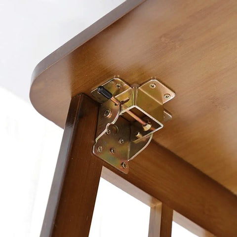 Built Tough Black Folding Table Hinge Featuring Automatic Self Locking Brackets For Heavy Duty Sofa Beds And Coffee Tables Zero To Ninety Pivot Galvanized Steel Hardware Kit on wooden table.