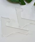 Premium Acrylic Router Template Set For Standing Cutting Boards, clear templates for precise wood shaping in a crafting setup.