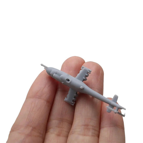 Hand holding Mi-24 Helicopter DIY Model Kit Uncolored Military Aircraft Parts Set For DIY Buffs, 54mm resin piece, scalable 1/2000 to 1/350
