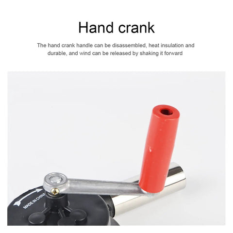 Close-up of Portable Hand Crank BBQ Air Blower manual crank handle in red, showcasing its folding design for easy use.